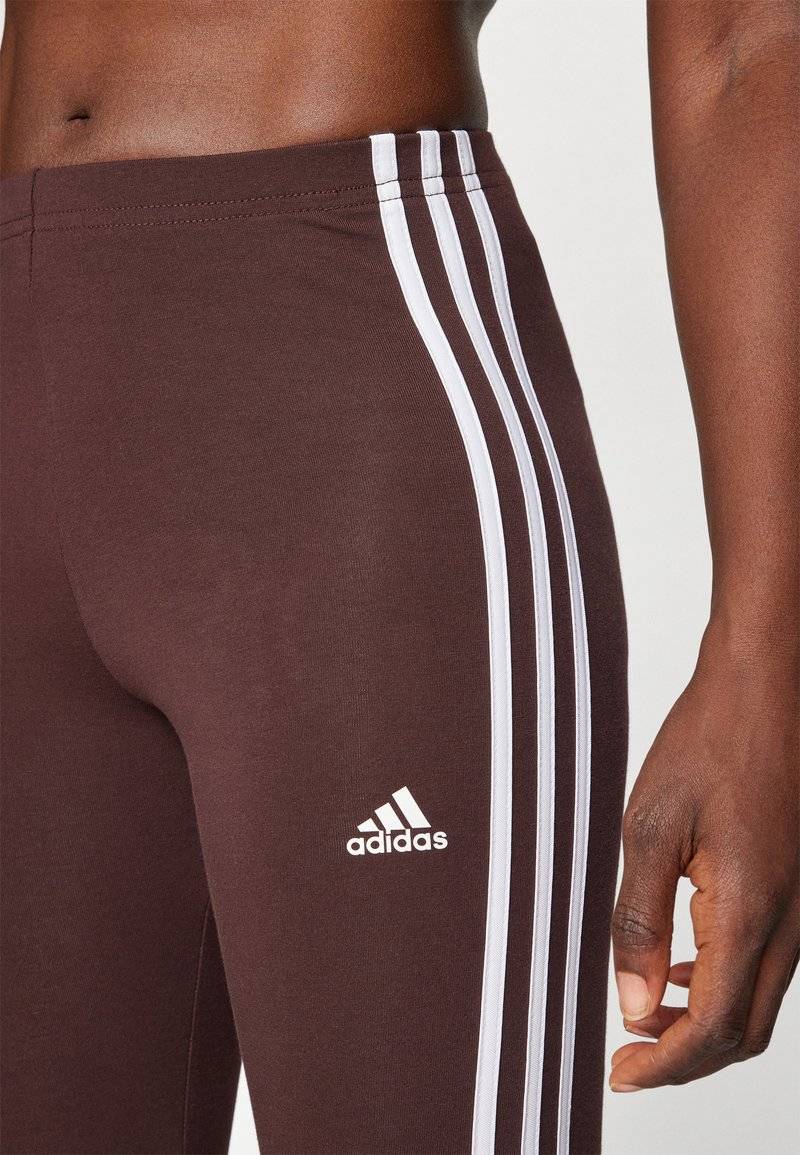 adidas Sportswear adidas Sportswear ESSENTIALS 3 STRIPES HIGH WAISTED - Leggings - shadow brown Tiefpreis