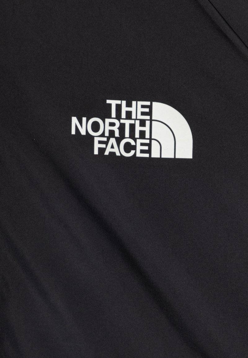 The North Face The North Face REVERSIBLE PERRITO HOODED UNISEX - Winter jacket - black Kostenlose Rückgabe