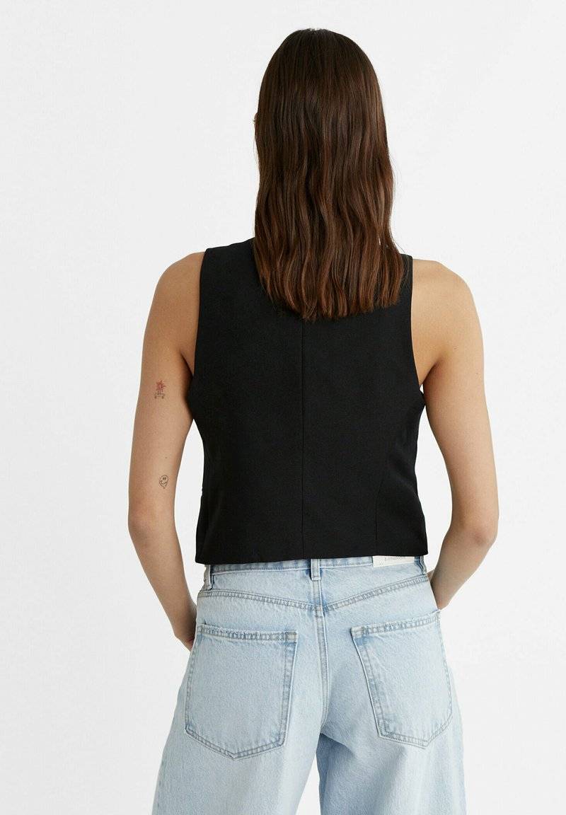 Stradivarius Stradivarius SHORT BUTTONED - Waistcoat - black Meist gekauft