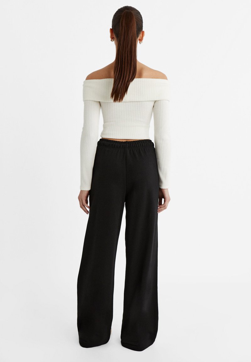 Stradivarius Stradivarius WIDE-LEG JOGGER - Tracksuit bottoms - black Blitzverkäufe