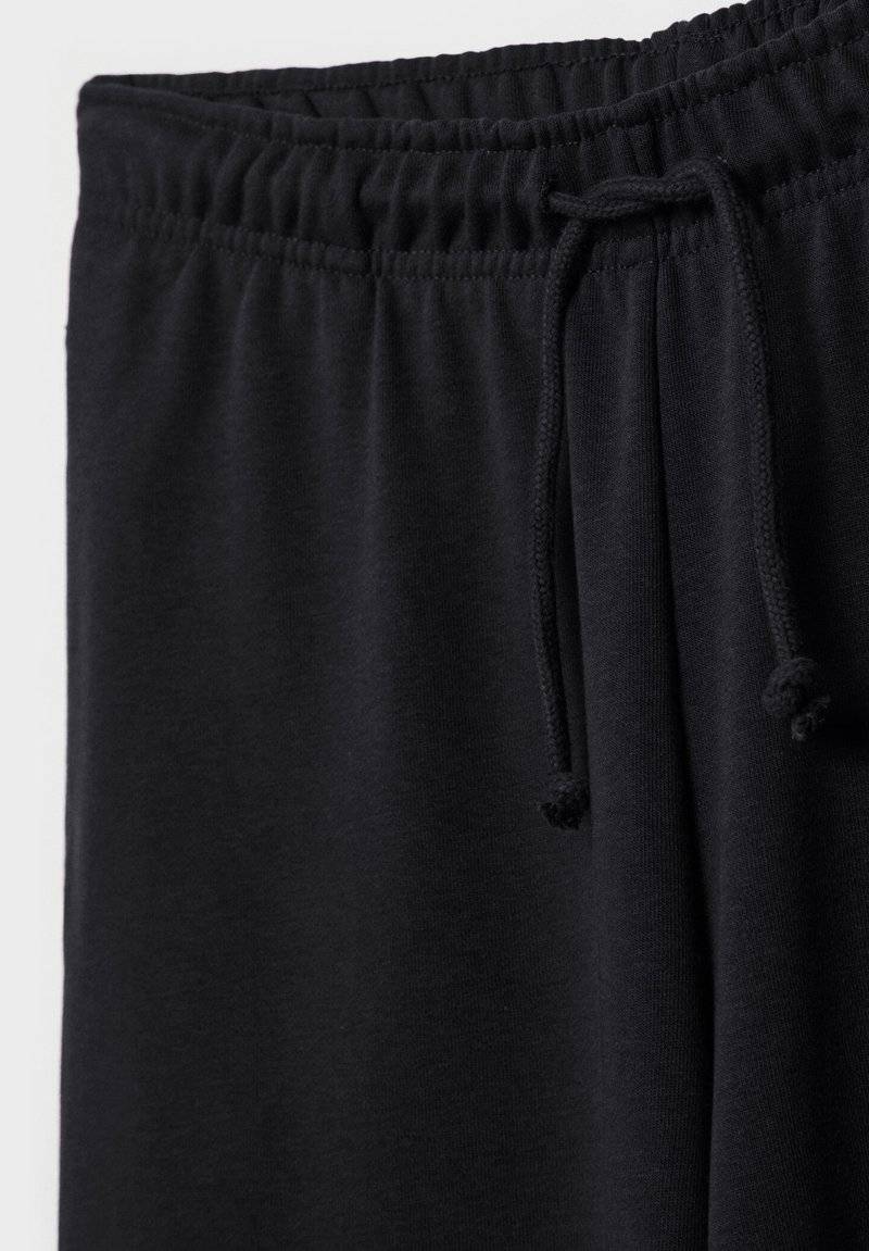 Stradivarius Stradivarius WIDE-LEG JOGGER - Tracksuit bottoms - black Blitzverkäufe