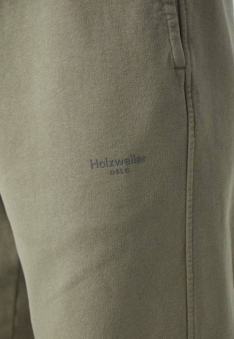 Holzweiler Holzweiler LAGOON OSLO TROUSERS UNISEX - Tracksuit bottoms - green Discount Store für neue Produkte