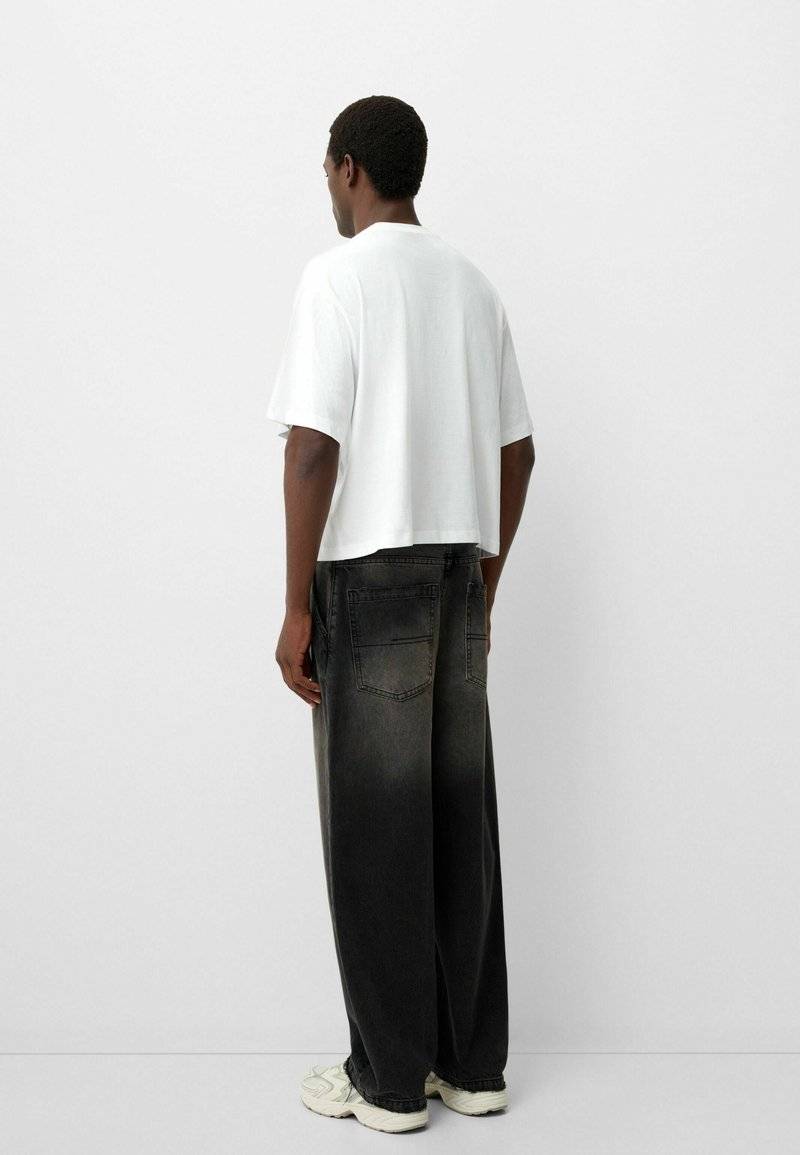 Bershka Bershka Relaxed fit jeans - black denim Speichern exportieren