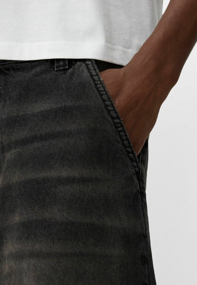 Bershka Bershka Relaxed fit jeans - black denim Speichern exportieren