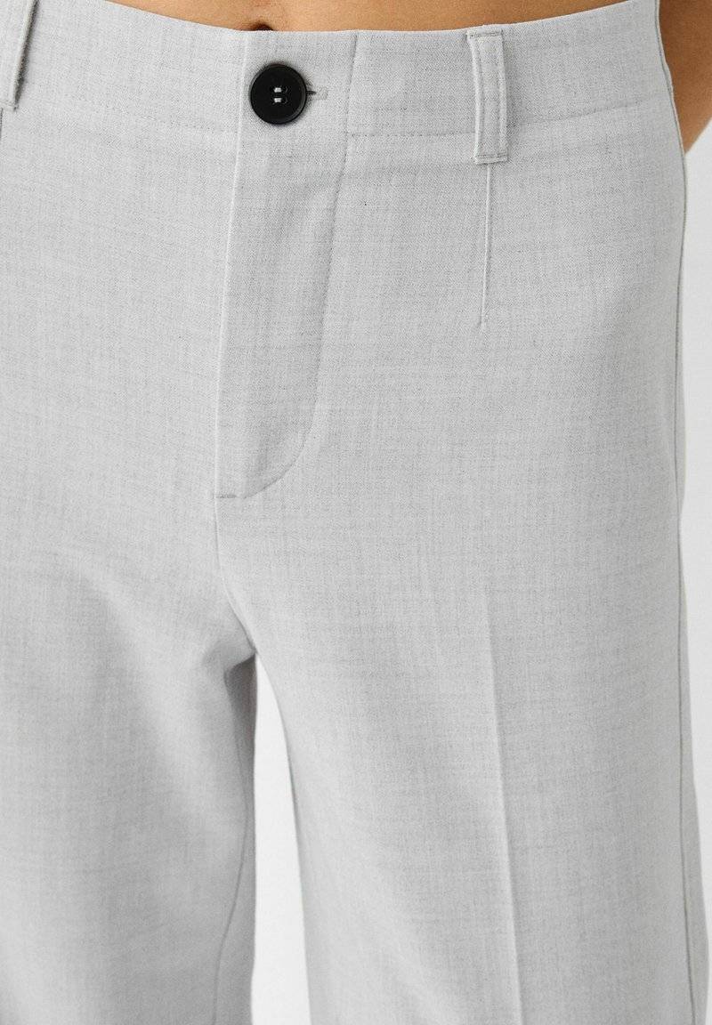 Bershka Bershka WIDE TAILORED - Trousers - mottled grey Verkauf