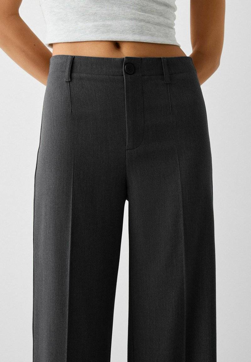 Bershka Bershka WIDE TAILORED - Trousers - mottled dark grey Fabrikverkauf