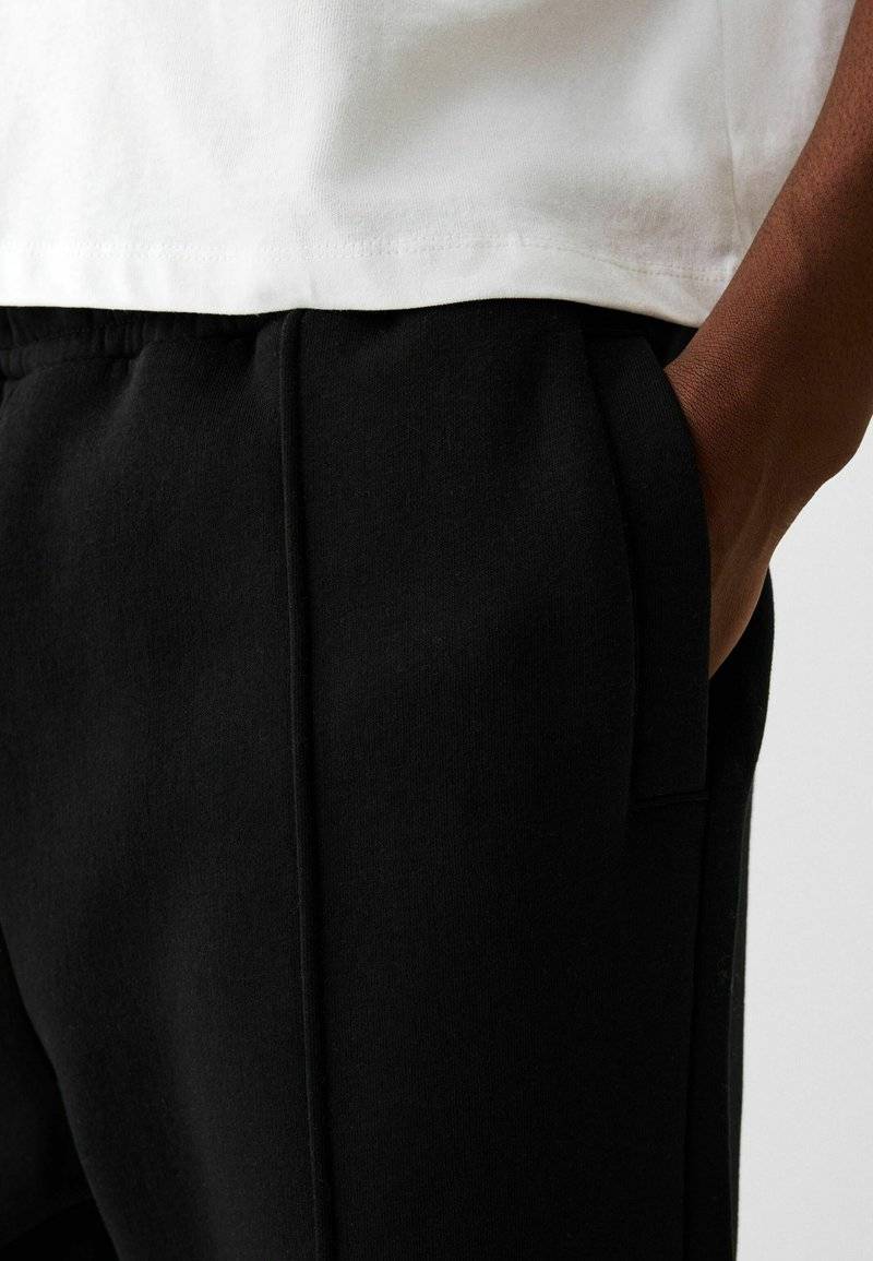 Bershka Bershka WIDE - Tracksuit bottoms - black Limitierter Zeitrabatt