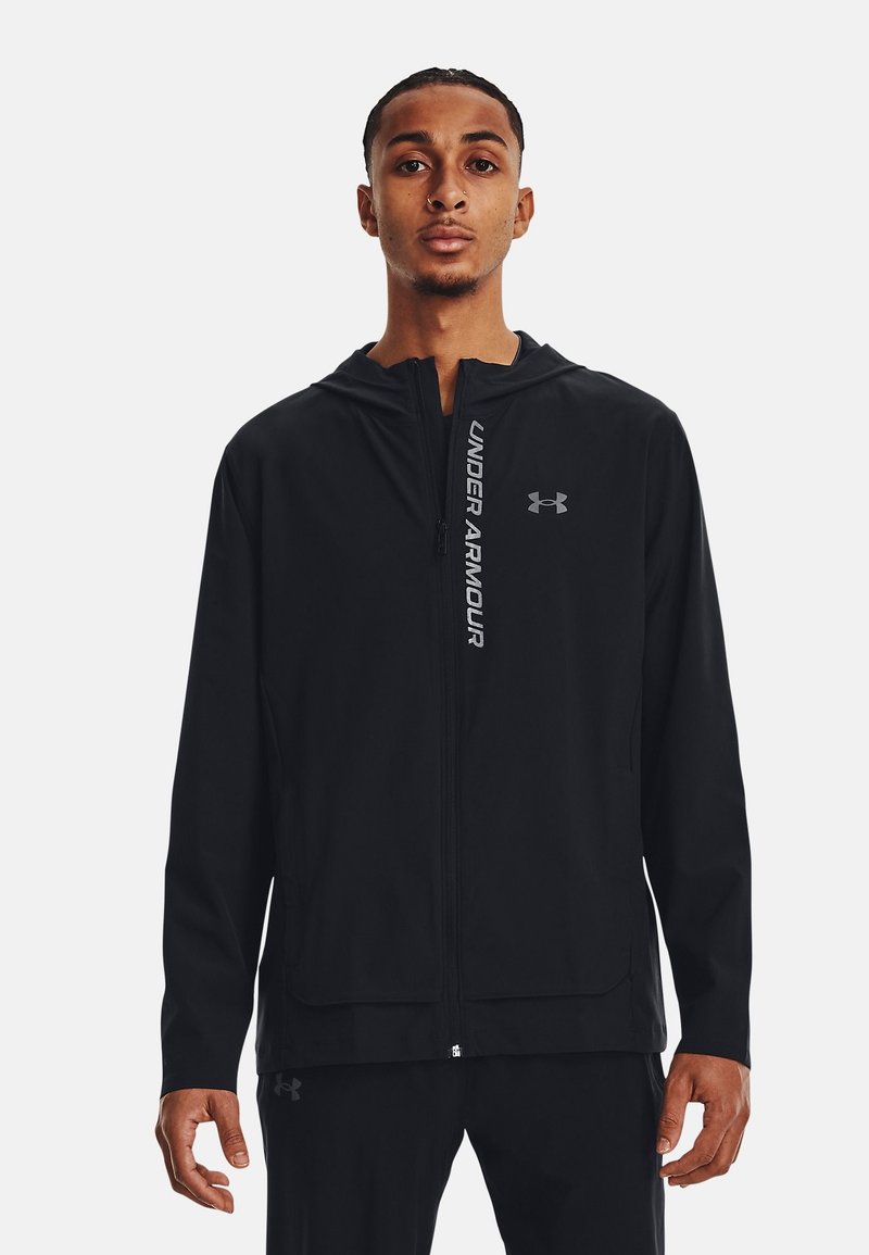 Under Armour Under Armour OUT THE STORM - Running jacket - black jet gray reflective Räumungsverkauf