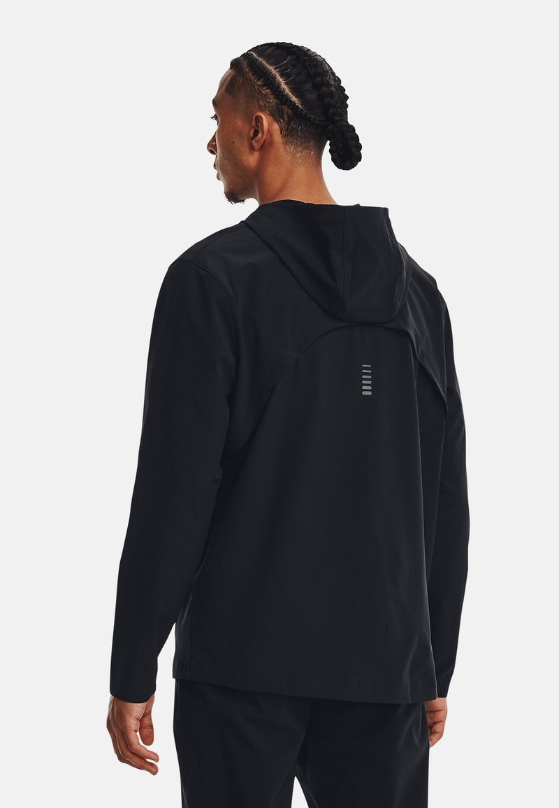 Under Armour Under Armour OUT THE STORM - Running jacket - black jet gray reflective Räumungsverkauf