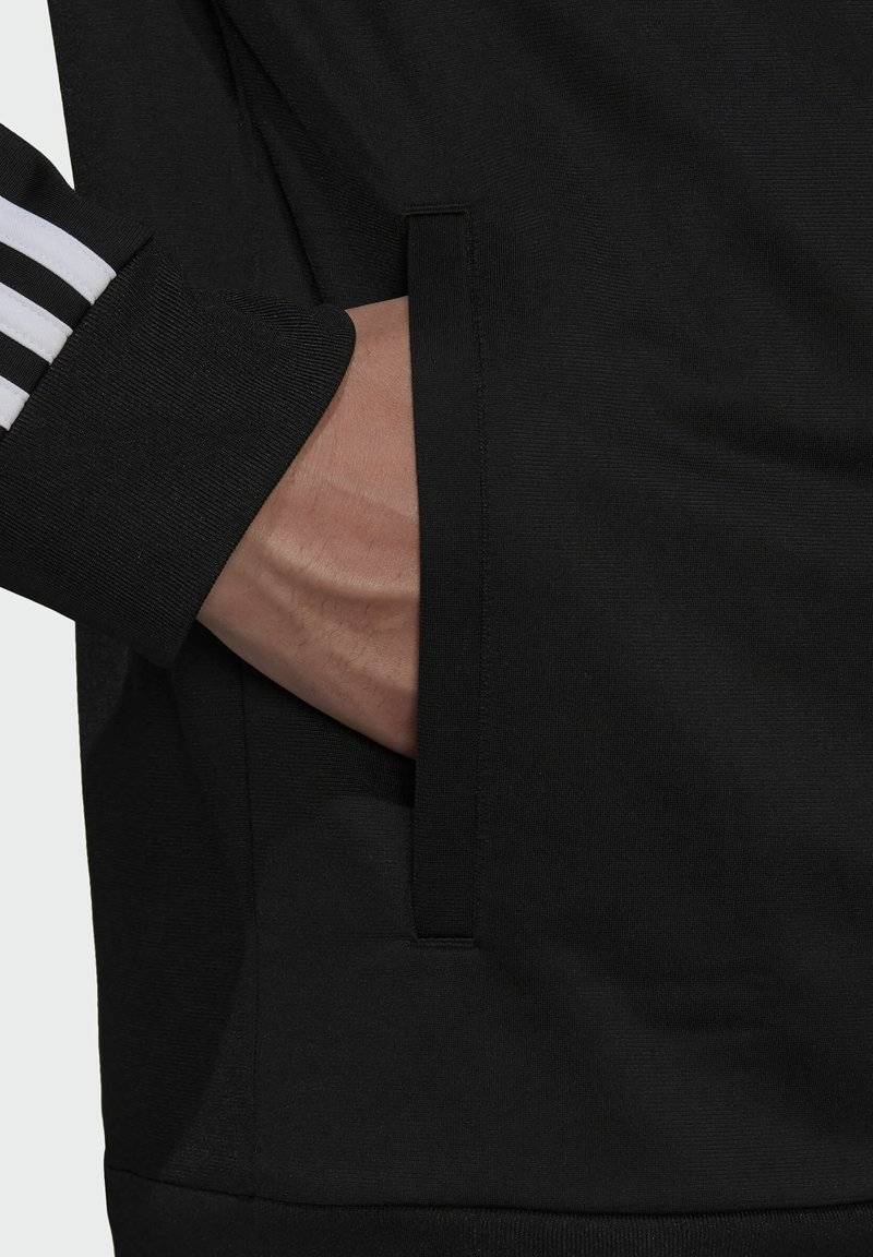 adidas Sportswear adidas Sportswear ESSENTIALS WARM-UP REGULAR 3-STRIPES - Training jacket - black Letzte 2 Tage