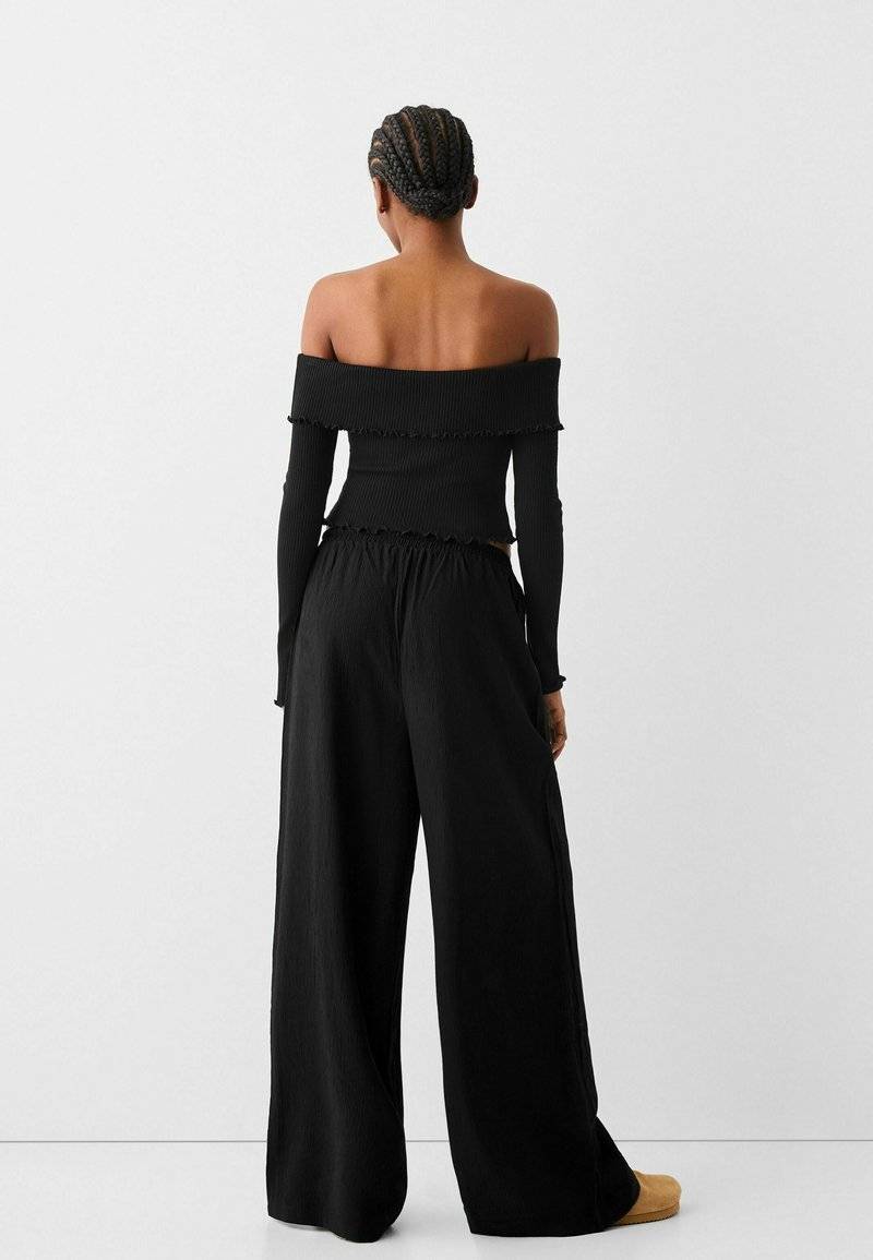 Bershka Bershka Trousers - black 2025