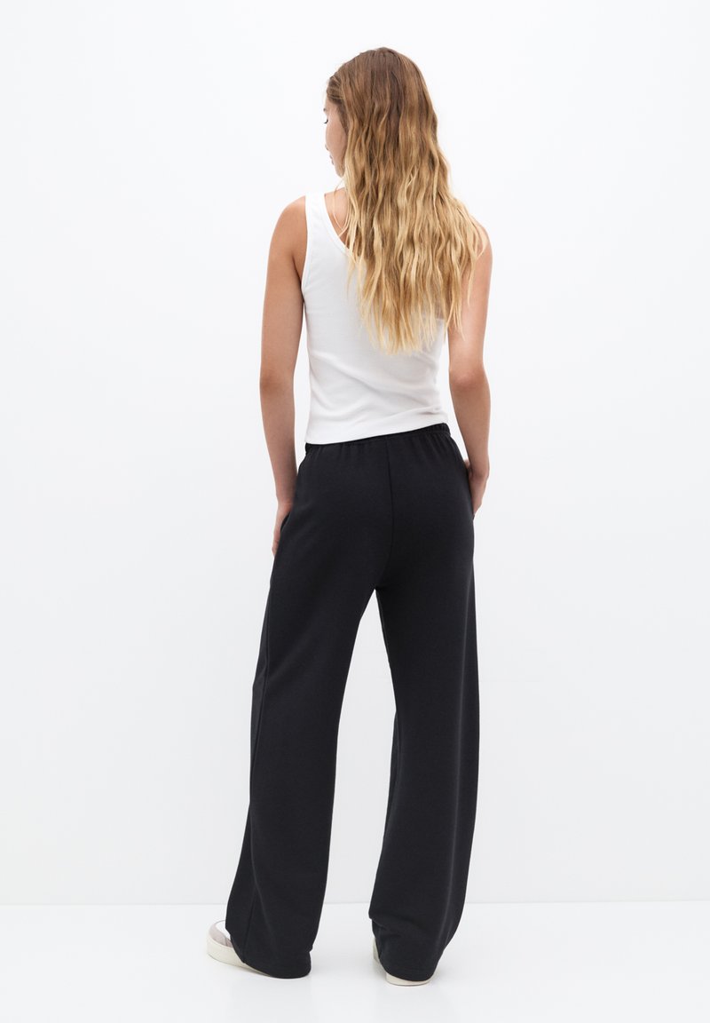PULL&BEAR PULL&BEAR WIDE-LEG - Tracksuit bottoms - black Fabrik Onlineshop