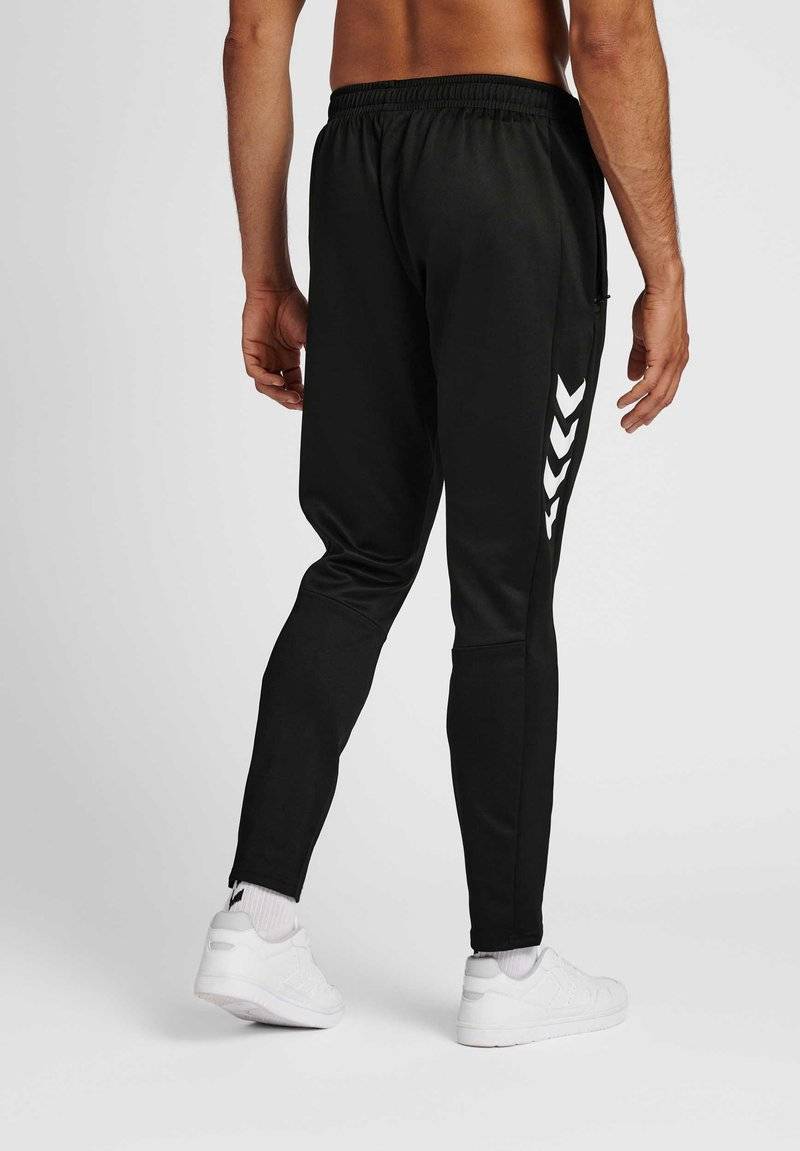 Hummel Hummel CORE XR TRAINING PANTS - Tracksuit bottoms - black Begrenztes Angebot