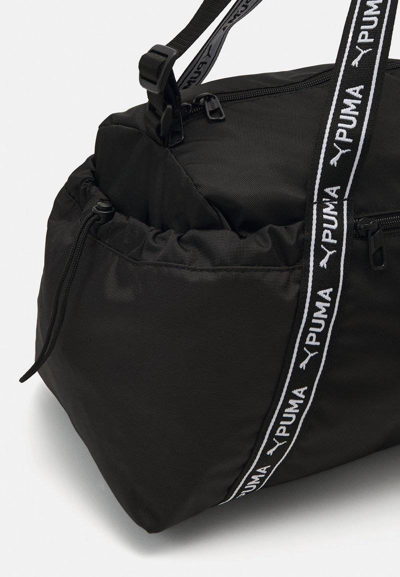 Puma Puma SPORT BAG - Sports bag - black Osterangebot
