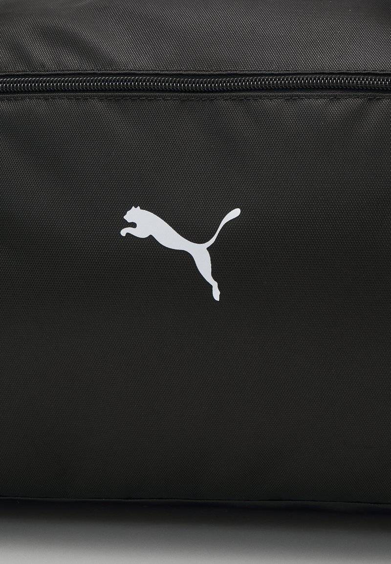 Puma Puma SPORT BAG - Sports bag - black Osterangebot