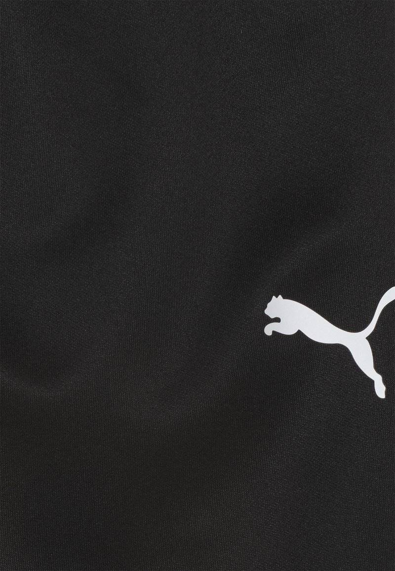 Puma Puma TEAMRISE POLY TRAINING UNISEX - Tracksuit bottoms Neuheiten