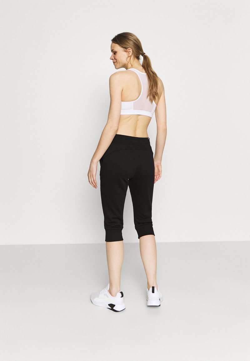 Puma Puma CAPRI - 3/4 sports trousers - black Hotsell