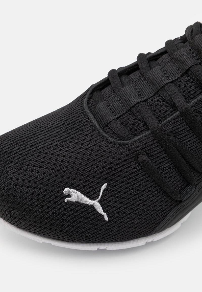 Puma Puma AXELION - Training shoe Valentinstagsangebot