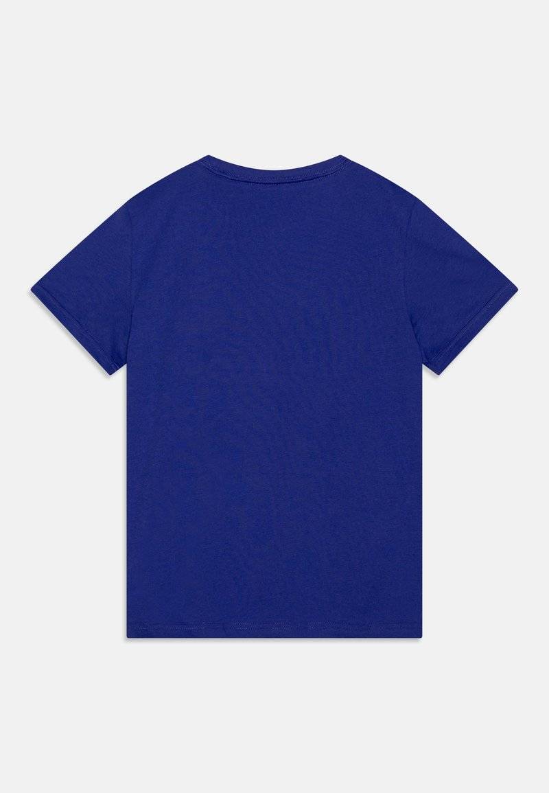 Puma Puma LOGO TEE UNISEX - Print T-shirt - lapis lazuli Neueste Mode