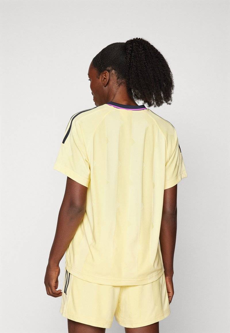 adidas Sportswear adidas Sportswear TIRO CUT STRIPES BOYFRIEND - Print T-shirt - almost yellow Bestseller