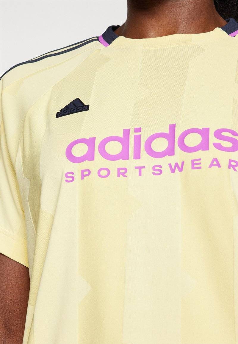 adidas Sportswear adidas Sportswear TIRO CUT STRIPES BOYFRIEND - Print T-shirt - almost yellow Bestseller