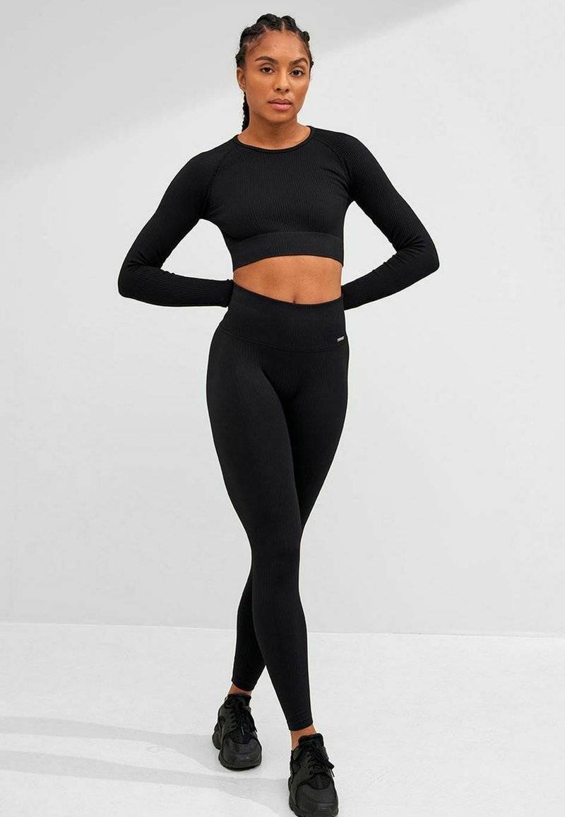 aim’n® aim’n® RIBBED SEAMLESS - Leggings - black Begrenzte Freigabe