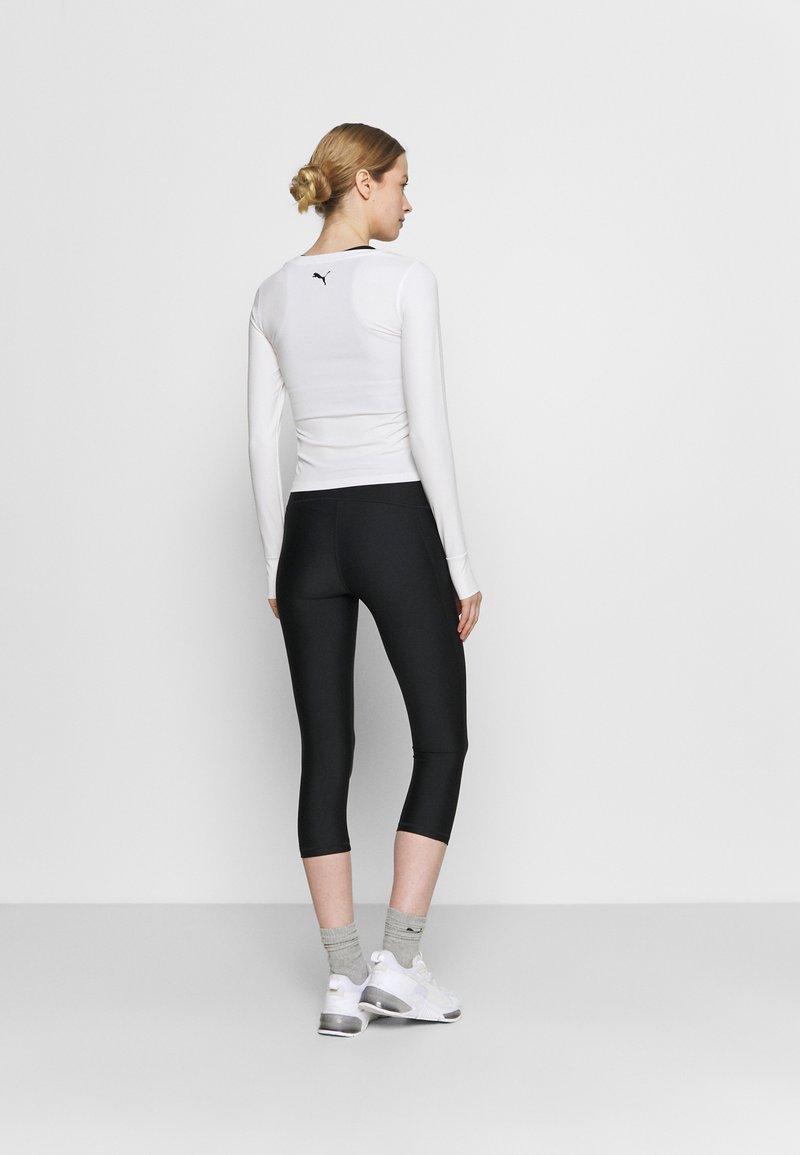 Under Armour Under Armour HI CAPRI - 3/4 sports trousers - black Meist gekauft
