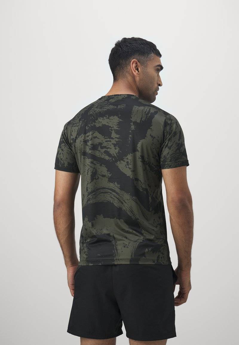Puma Puma TRAIN ALL DAY TEE - Print T-shirt - dark olive Flash Sale
