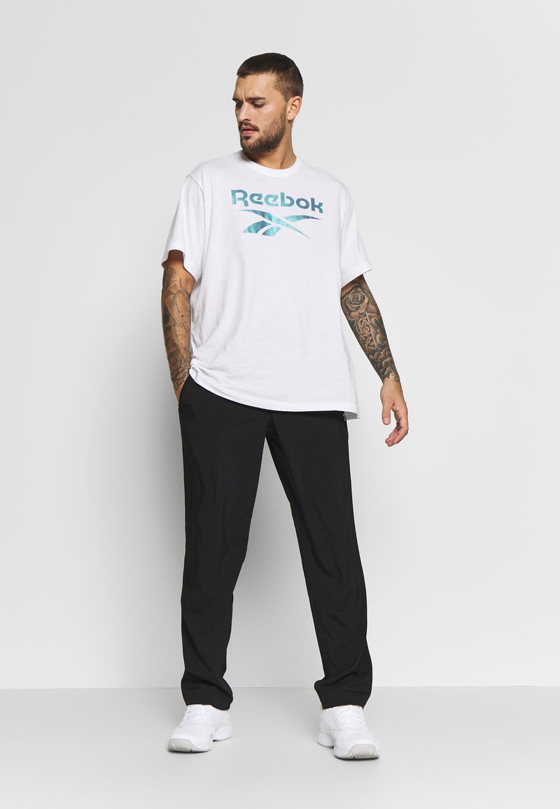 Reebok Reebok TRAINING ESSENTIALS WOVEN SPEEDWICK WORKOUT READY - Trousers - black Saisonschlussverkauf