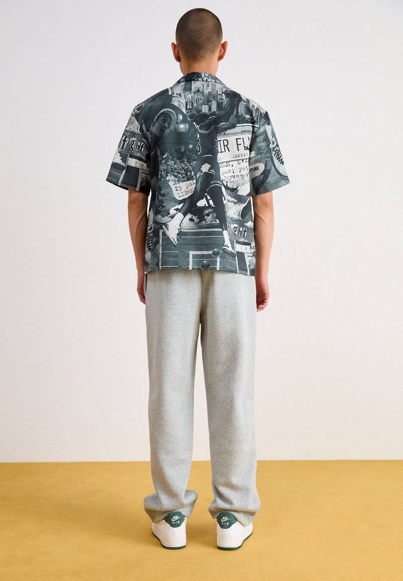 Nike Sportswear Nike Sportswear BUNGIE PANT - Tracksuit bottoms - grey heather Begrenzte Freigabe
