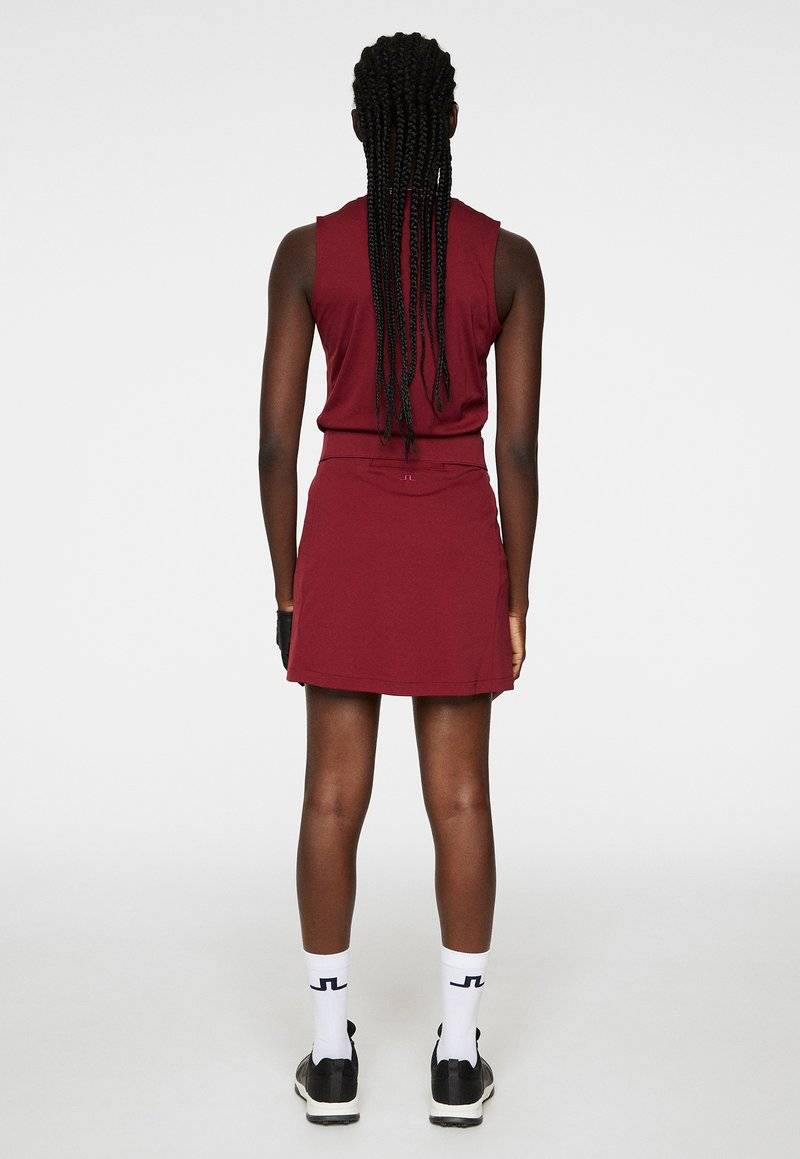 J.LINDEBERG Sports J.LINDEBERG Sports AMELIE MID - Sports skirt - cabernet Bestseller