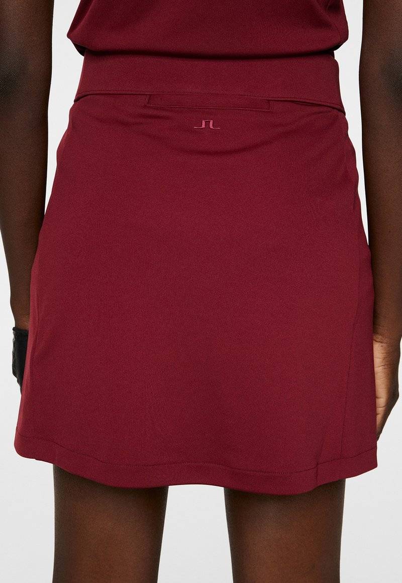 J.LINDEBERG Sports J.LINDEBERG Sports AMELIE MID - Sports skirt - cabernet Bestseller