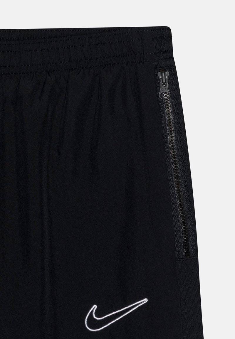 Nike Performance Nike Performance ACADEMY 23 TRACK PANT UNISEX - Tracksuit bottoms Letzte 2 Tage