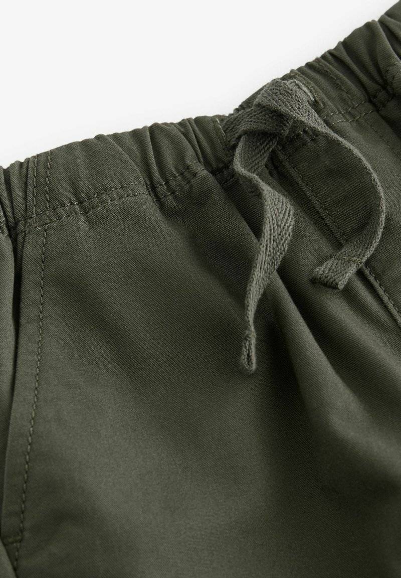 Next Next SIDE POCKET PULL-ON STANDARD - Trousers - khaki green Großer Ausverkauf
