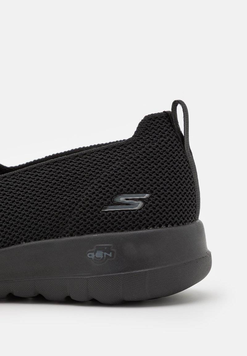 Skechers Performance Skechers Performance GO WALK SLIP ON - Walking trainers - black Begrenzte Freigabe