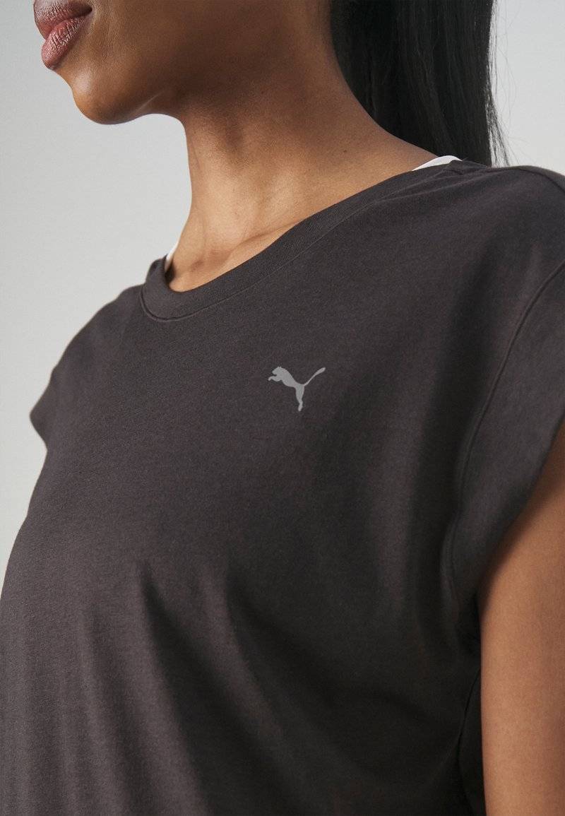 Puma Puma STUDIO FOUNDATIONS TEE - Sports T-shirt - black Versandkostenfrei
