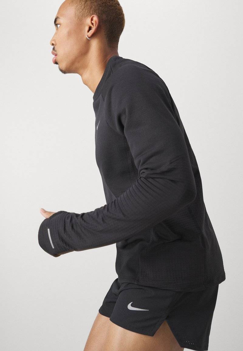 Nike Performance Nike Performance FAST SHORT - Sports shorts Bis zu 55% Rabatt