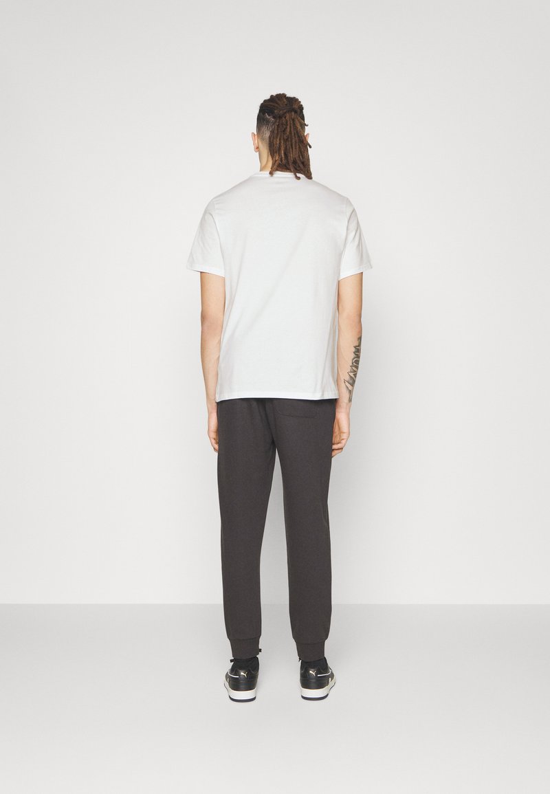 Converse Converse GO TO STAR CHEVRON TEE UNISEX - Print T-shirt - white zollfrei