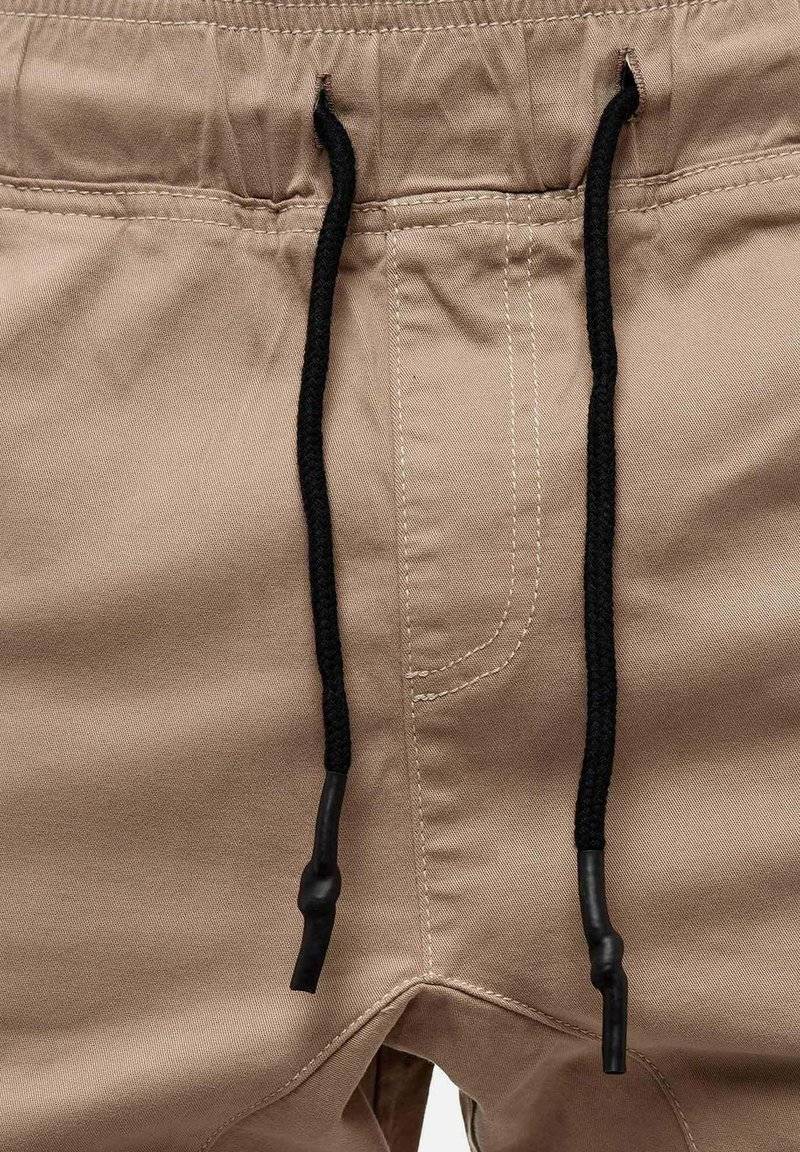 Tazzio Tazzio Cargo trousers - beige Black Friday Preise