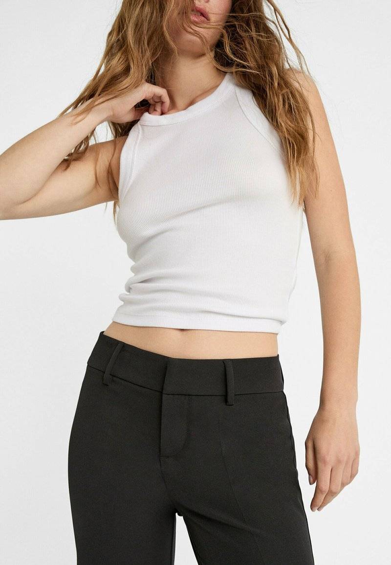 Stradivarius Stradivarius TAILORED FLARED - Trousers - black 2025