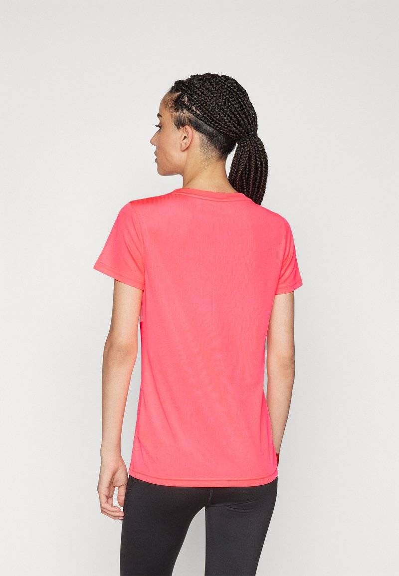 Puma Puma PERFORMANCE TEE - Sports T-shirt - sunset glow Kostenloser Versand