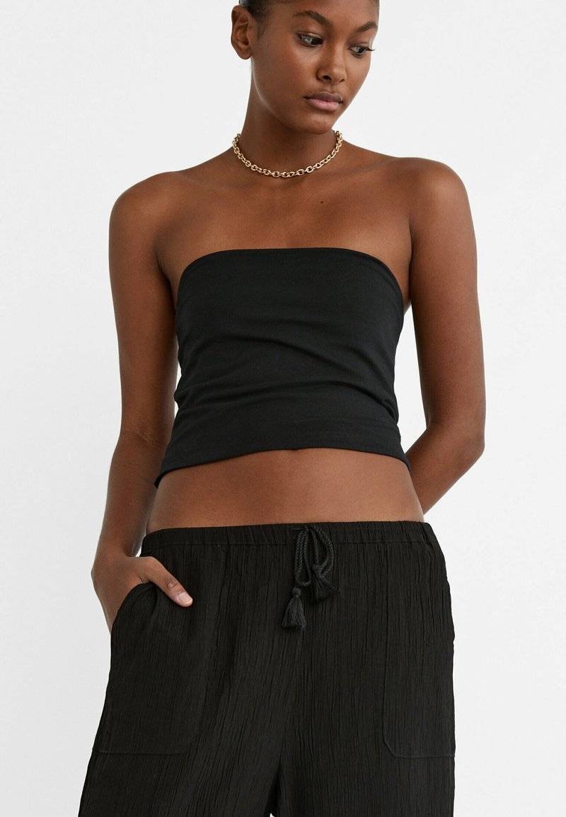 Stradivarius Stradivarius FLOWING CULOTTES - Trousers - black Fabrik Onlineshop