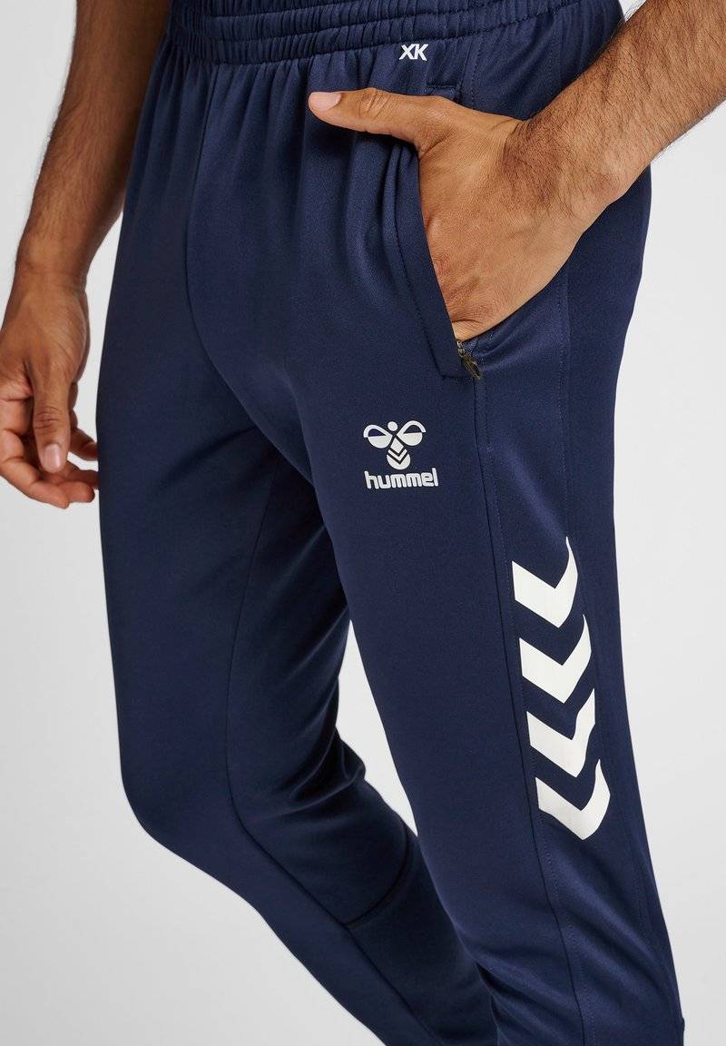 Hummel Hummel CORE XR TRAINING PANTS - Tracksuit bottoms - marine Flash Sale