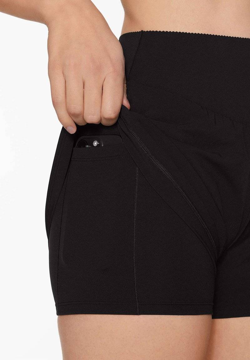 OYSHO OYSHO COMPRESSIVE - Sports shorts - black Cyber Monday