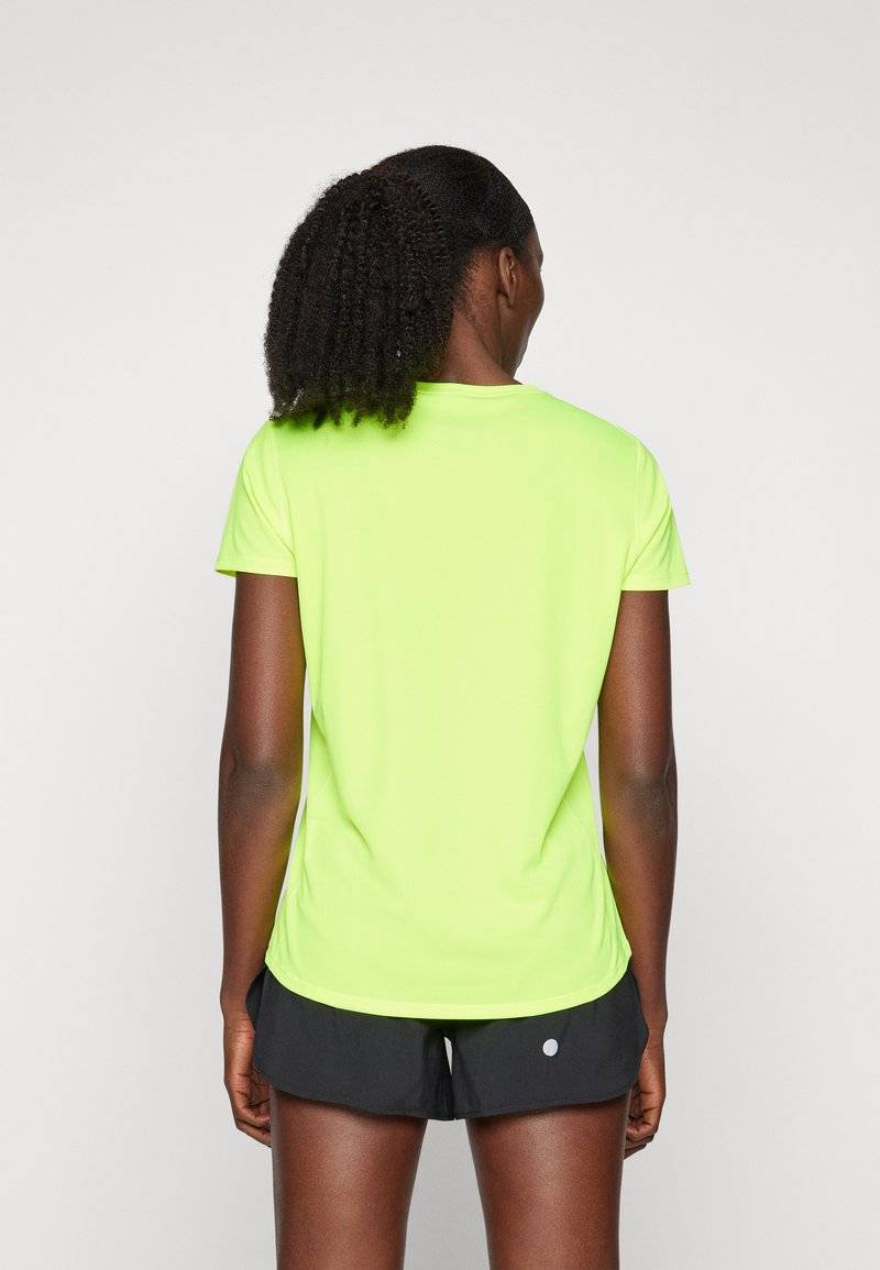 ASICS ASICS CORE TOP - Sports T-shirt - safety yellow Weihnachtsangebot