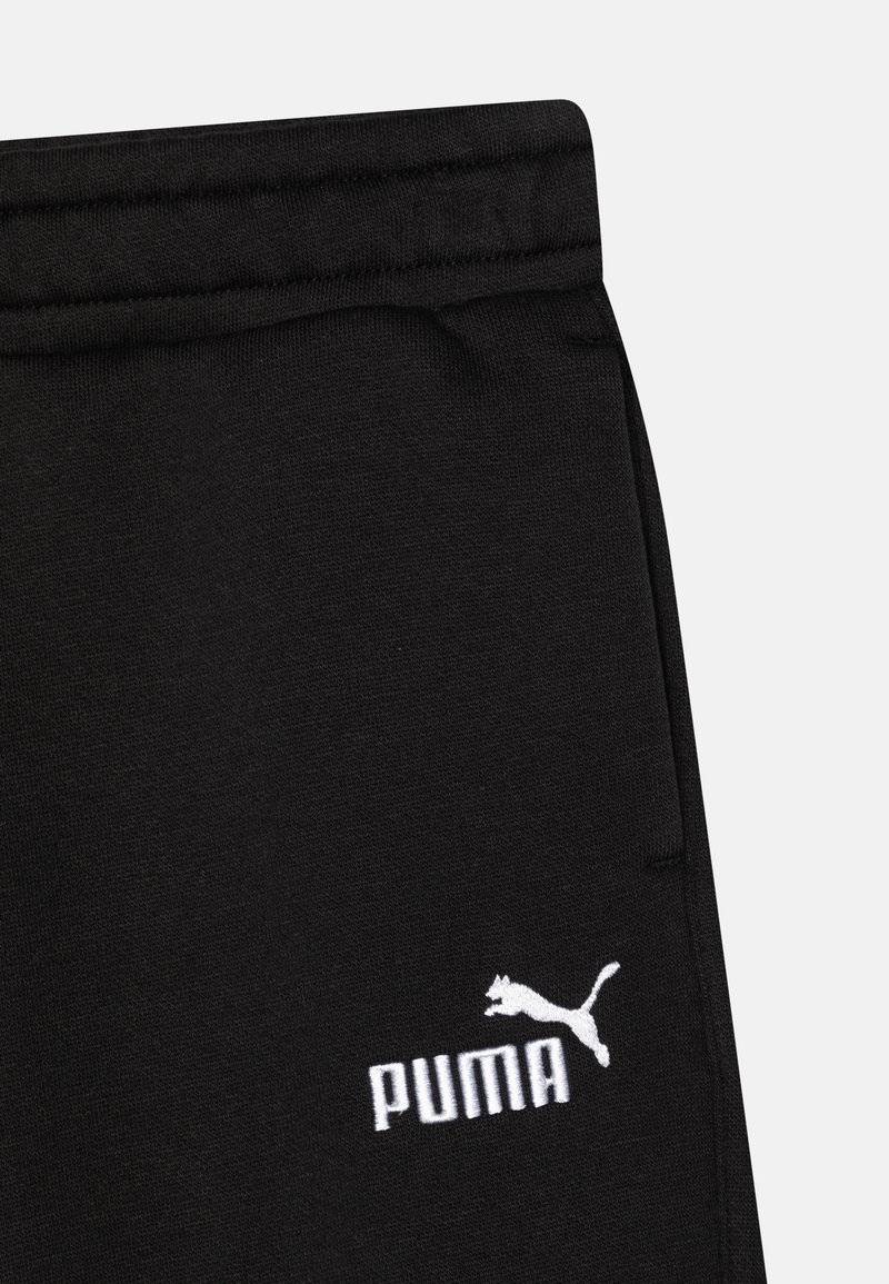 Puma Puma EMBROIDERY UNISEX - Tracksuit bottoms - black Osterangebot