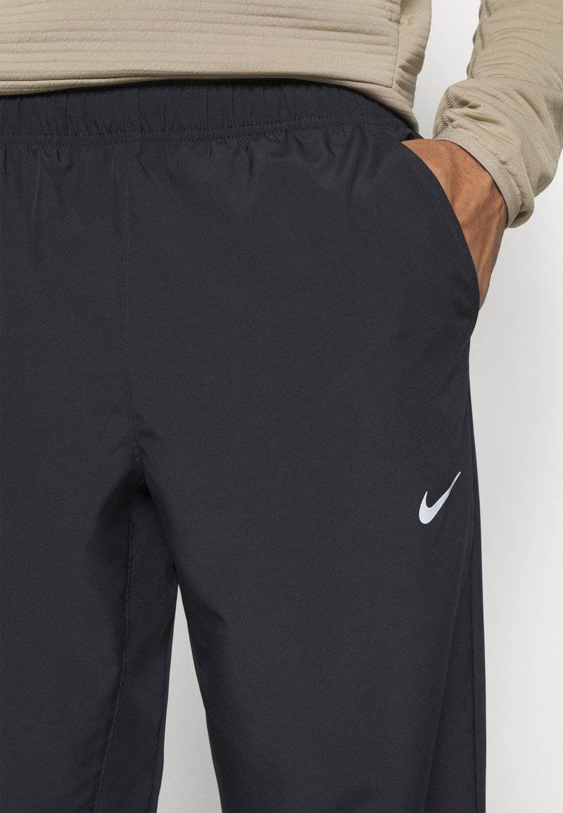 Nike Performance Nike Performance FORM PANT - Tracksuit bottoms Vatertagsangebot