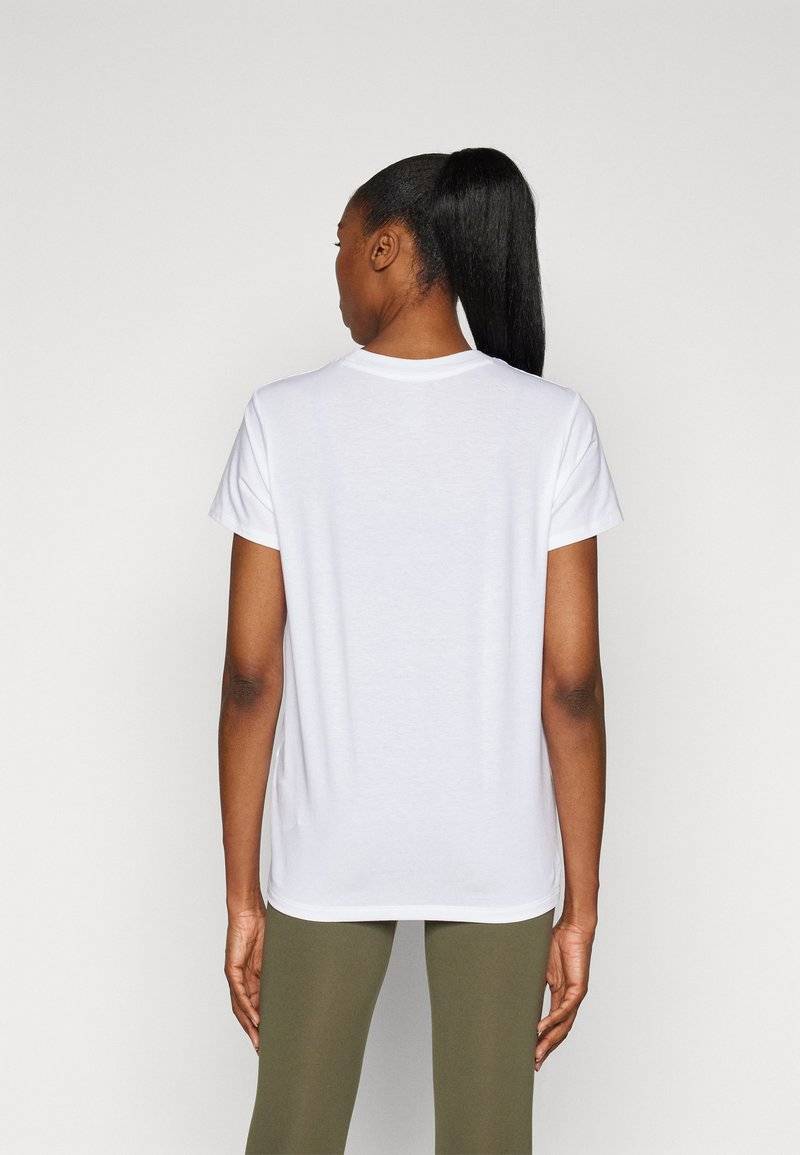 Under Armour Under Armour CAMPUS CORE - Sports T-shirt Jubiläumsangebot