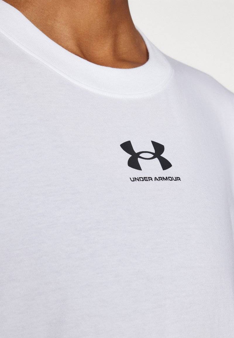 Under Armour Under Armour CAMPUS CORE - Sports T-shirt Jubiläumsangebot
