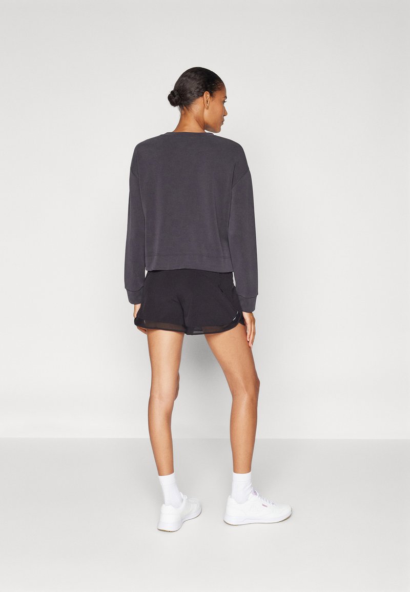 Athleta Athleta HIGH RISE RACER RUN SHORT - Sports shorts - black Vatertagsangebot